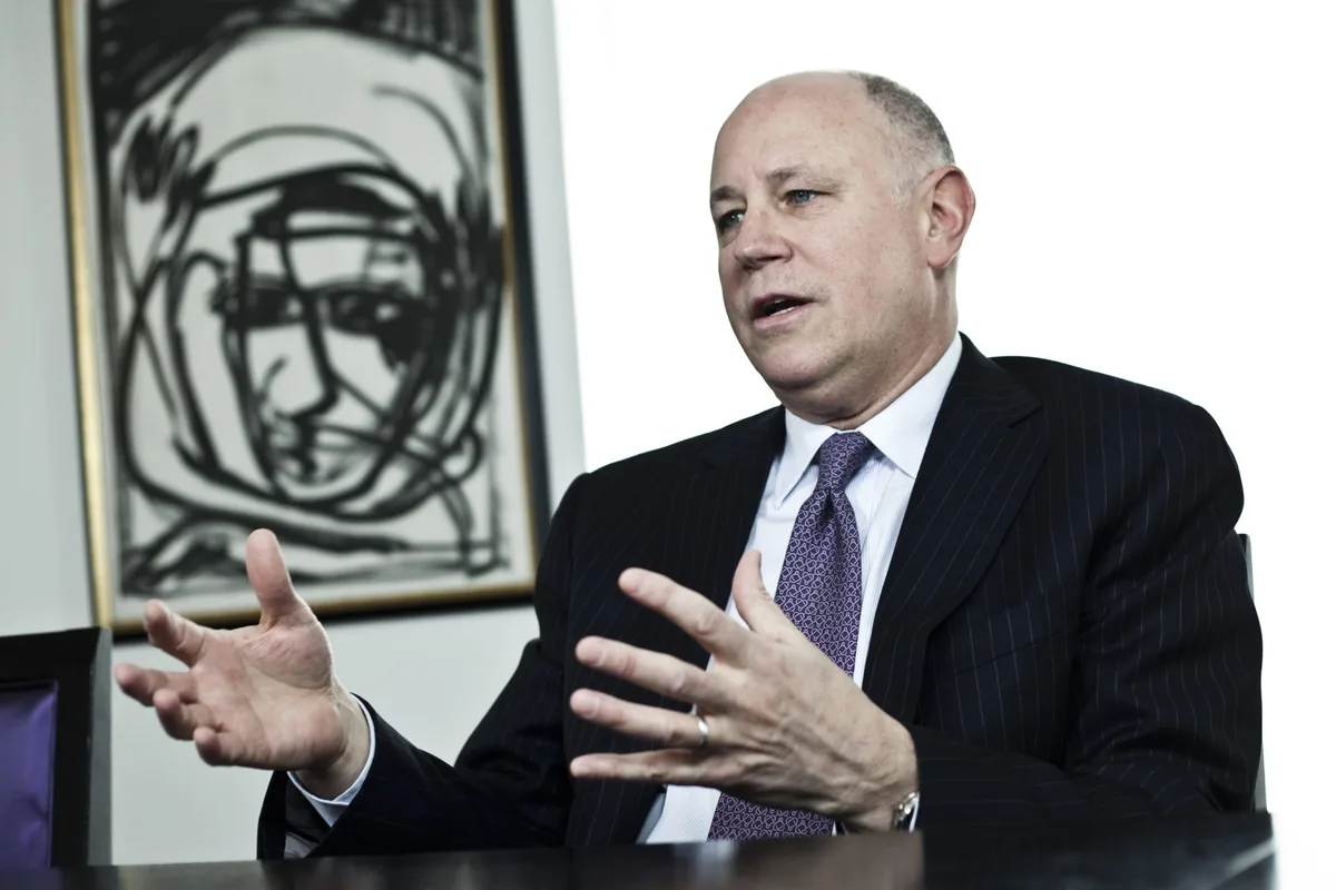 Meet the self-made billionaire who bought a nearly bankrupt company off Warren Buffett for $1,000 and turned it into a $85 billion giant