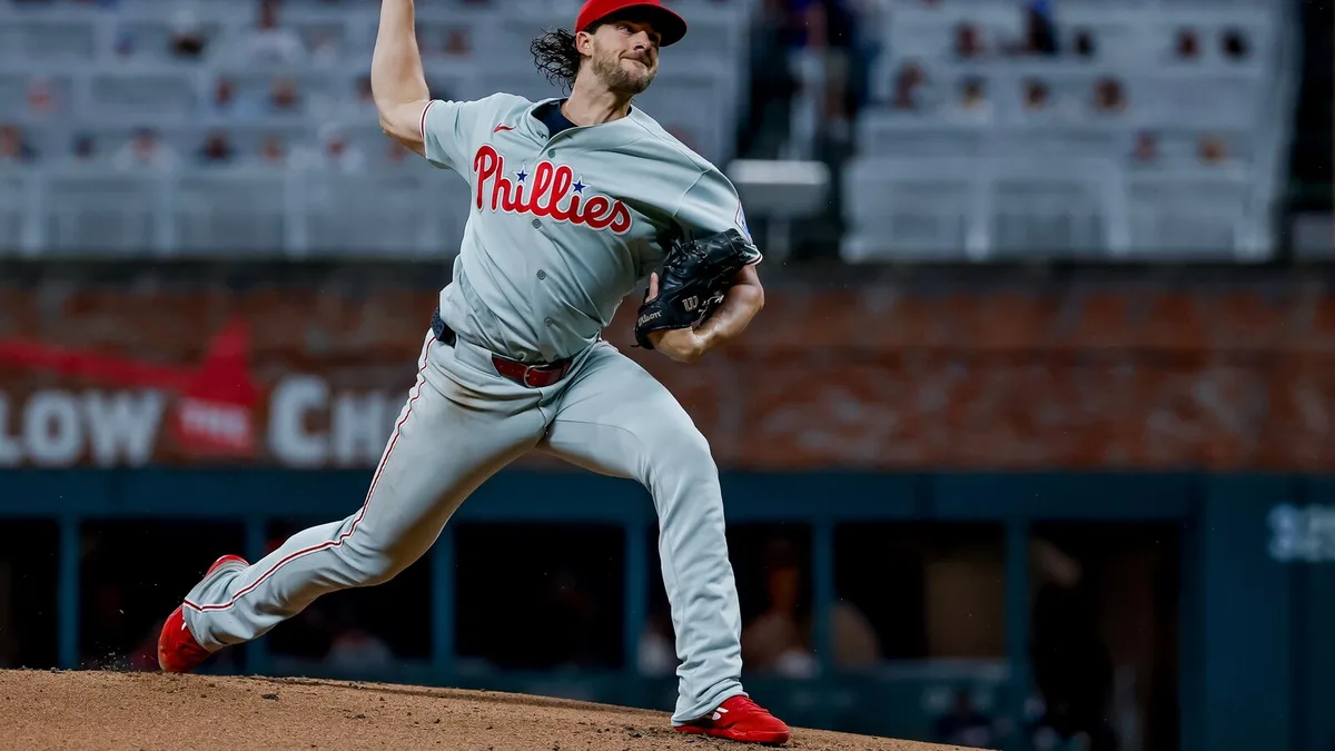 Braves outlast Phillies 6-5 in 11 innings in opener of key NL East series