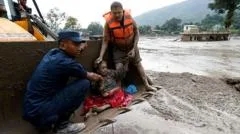 People pulled from mud in Nepal amid rescue operations